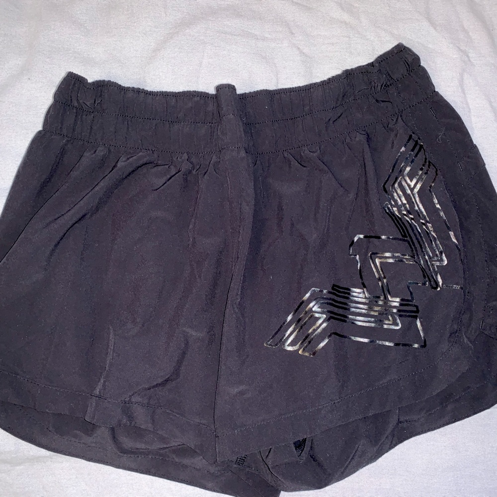 Black wonder woman athletic shorts. Size small or 0/2.